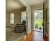 Inviting entryway with hardwood floors, neutral walls, and view to the front yard at 1283 Maple St, Conyers, GA 30013