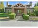 Community clubhouse exterior with stone accents, well-maintained landscaping, and easy access at 1610 Apollo Dr, Suwanee, GA 30024