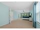 Large main bedroom offers ceiling fan, natural light, carpet and adjoins the main bath at 1610 Apollo Dr, Suwanee, GA 30024