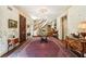 Elegant foyer with curved staircase, chandelier, and refined decor creating a grand entrance at 4195 Woodland Brook Se Dr, Atlanta, GA 30339