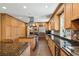 Well-equipped kitchen boasting a large island, stainless steel appliances, and abundant storage space at 4195 Woodland Brook Se Dr, Atlanta, GA 30339