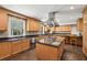 Gourmet kitchen with a center island, granite countertops, stainless steel appliances and ample cabinets at 4195 Woodland Brook Se Dr, Atlanta, GA 30339