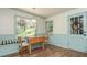 Cozy dining area with a window seat, natural light, and charming details at 6795 Brandon Mill Rd, Atlanta, GA 30328