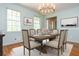 Elegant dining room with wood floors, chandelier and space to entertain at 6795 Brandon Mill Rd, Atlanta, GA 30328