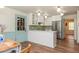 Updated kitchen featuring white countertops, stainless steel refrigerator, and stylish cabinetry at 6795 Brandon Mill Rd, Atlanta, GA 30328