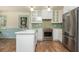 Charming kitchen with stainless steel oven, refrigerator, and tile backsplash at 6795 Brandon Mill Rd, Atlanta, GA 30328