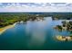 Scenic aerial view of a large lake with wooded shores, offering stunning waterfront properties at 9176 Lakeview Parkway, Villa Rica, GA 30180