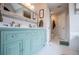 Bathroom with double sink vanity and view to another bathroom space at 9176 Lakeview Parkway, Villa Rica, GA 30180