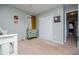 Comfortable bedroom with a light green paint, soft carpet, and a double closet, creating an inviting room at 9176 Lakeview Parkway, Villa Rica, GA 30180