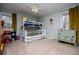 Comfortable bedroom with a bunk bed, soft carpet, and ample space for play, creating an inviting room at 9176 Lakeview Parkway, Villa Rica, GA 30180