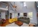 Spacious living room features vaulted ceilings, hardwood floors, and abundant natural light at 9176 Lakeview Parkway, Villa Rica, GA 30180