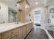 Modern bathroom featuring dual sinks, light wood cabinetry, and a walk-in glass shower at 00 Daxton Dr (Lot 74), Canton, GA 30115