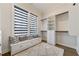 Bright closet with built-in shelving and a window seat with storage underneath at 00 Daxton Dr (Lot 74), Canton, GA 30115