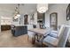 Dining room with view to kitchen and island, wooden table and decor at 00 Daxton Dr (Lot 74), Canton, GA 30115