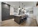 Modern kitchen with a large island, stainless steel appliances, and bar stool seating at 00 Daxton Dr (Lot 74), Canton, GA 30115