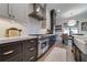 Contemporary kitchen design with gray cabinetry, modern appliances, and stylish lighting at 00 Daxton Dr (Lot 74), Canton, GA 30115