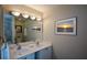 Bathroom featuring a double vanity sink, a mirror, and recessed lighting at 3259 Clairmont North Ne, Brookhaven, GA 30329