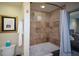 Bathroom featuring a shower, a tub with shower curtain, and a toilet at 3259 Clairmont North Ne, Brookhaven, GA 30329