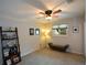 Bedroom featuring a ceiling fan, a window with blinds, and carpet at 3259 Clairmont North Ne, Brookhaven, GA 30329