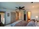 Bedroom boasts a ceiling fan, carpet, and ample closet space at 3259 Clairmont North Ne, Brookhaven, GA 30329