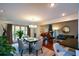 Bright dining room with hardwood floors, modern chandelier, and stylish decor at 3259 Clairmont North Ne, Brookhaven, GA 30329