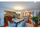 Light-filled dining area featuring hardwood floors and modern chandelier at 3259 Clairmont North Ne, Brookhaven, GA 30329