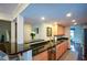 Bright kitchen with black granite counters, stainless steel sink, and modern faucet fixtures at 3259 Clairmont North Ne, Brookhaven, GA 30329