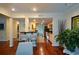 Open living area featuring hardwood floors, modern seating, and an open bar area at 3259 Clairmont North Ne, Brookhaven, GA 30329