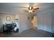 Office space featuring a desk, carpet, a ceiling fan, and natural light at 3259 Clairmont North Ne, Brookhaven, GA 30329