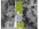This aerial view showcases the home and its spacious, green backyard and the proximity to a tree-lined, quaint neighborhood at 3991 Centennial Trl, Duluth, GA 30096