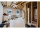 Unfinished basement featuring open beams, with two windows offering natural light at 3991 Centennial Trl, Duluth, GA 30096