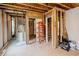 Spacious unfinished basement featuring wooden beams, offering potential for customization at 3991 Centennial Trl, Duluth, GA 30096