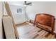 Bedroom showcasing new wood flooring and a ceiling fan, offering a clean and modern look at 3991 Centennial Trl, Duluth, GA 30096