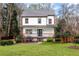 Charming two-story home with a well-manicured lawn and inviting front porch at 3991 Centennial Trl, Duluth, GA 30096