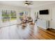 Bright living room with access to deck, wood flooring and lots of natural light at 3991 Centennial Trl, Duluth, GA 30096