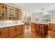 Spacious kitchen features wood floors, an island with seating, lots of cabinet space, and a breakfast nook at 535 Telford Pl, Atlanta, GA 30342
