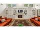 Cozy living room with fireplace, built-in shelving and recessed lighting at 535 Telford Pl, Atlanta, GA 30342