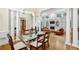 Open-concept living room with fireplace, built-in shelving and abundant natural light at 535 Telford Pl, Atlanta, GA 30342