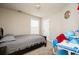 Bedroom featuring a cozy bed, carpeted floors, and natural light at 246 Cavendar Way # 16, Marietta, GA 30066
