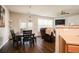 Charming dining area with a wood table and bench, bathed in natural light at 246 Cavendar Way # 16, Marietta, GA 30066