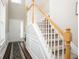 Inviting foyer with staircase and beautiful floors provides a warm welcome at 246 Cavendar Way # 16, Marietta, GA 30066