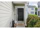 Close-up of a welcoming front door with sidelight and charming 