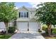Charming two-story home with a two-car garage and beautifully landscaped front yard at 246 Cavendar Way # 16, Marietta, GA 30066