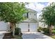 Inviting two-story home with an attached two-car garage and well-maintained landscaping at 246 Cavendar Way # 16, Marietta, GA 30066