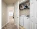 Convenient laundry room with washer and dryer, located in hallway closet at 246 Cavendar Way # 16, Marietta, GA 30066