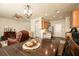 Open-concept living area with wood floors seamlessly connects the dining and kitchen spaces at 246 Cavendar Way # 16, Marietta, GA 30066