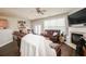 Spacious living room with fireplace, hardwood floors, and ample natural light at 246 Cavendar Way # 16, Marietta, GA 30066