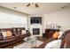 Comfortable living room features a fireplace and plenty of seating at 246 Cavendar Way # 16, Marietta, GA 30066