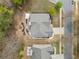 An aerial view shows the manicured lawn and paved driveway of the home at 251 Manous Way, Canton, GA 30115