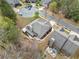 The rear of the house shows a covered patio and firepit at 251 Manous Way, Canton, GA 30115